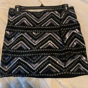 Express mini skirt. Tribal print with sequin. Stretchy.